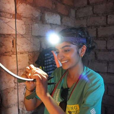 In a Service-Learning project held in Rwanda, PolyU students help install solar panels to generate electricity for rural households.