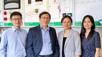 Professor Wang Shengwei (2nd from left) and his research team