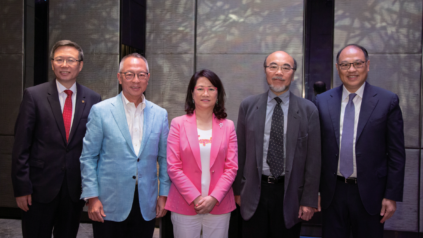 Dr Ngan (centre), and (from right) PolyU Council Chairman Dr Lam Tai-fai, Honorary Court Chairmen Dr Roy Chung and Dr the Hon. Victor Lo, and President Jin-Guang Teng