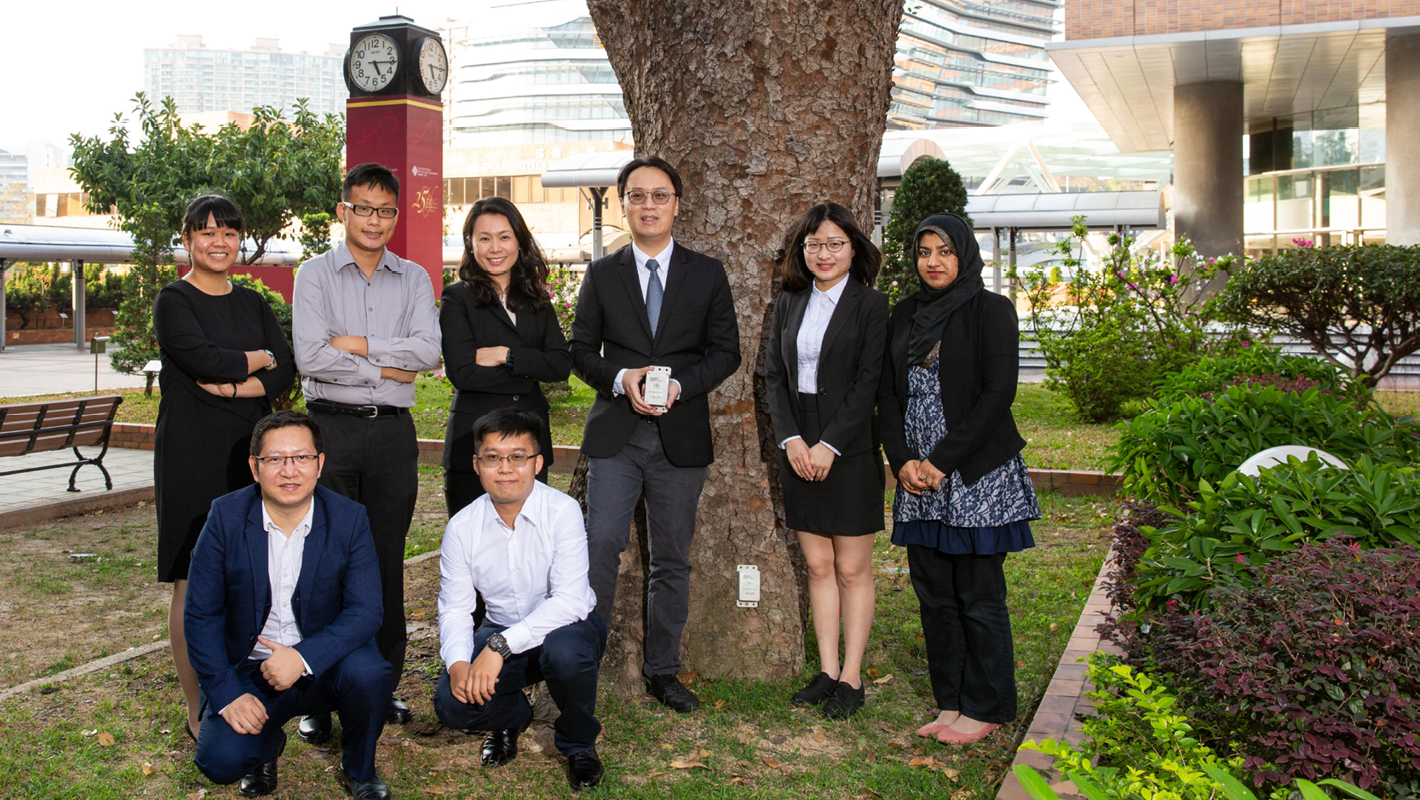 Dr Charles Wong (back row, third from right) and team membersdeveloped the Smart Monitoring System for Urban Tree Management