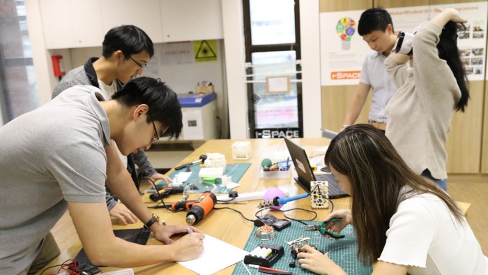 PolyU students crafting their works at the i-Space, a digital makerspace for them to explore emerging technologies