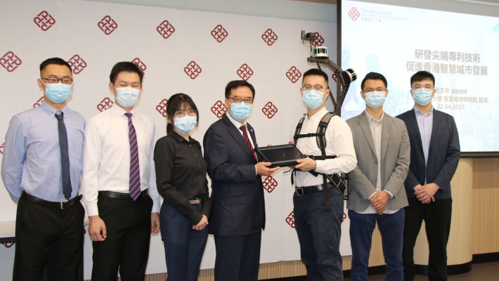 Professor John Shi (middle) and his research team