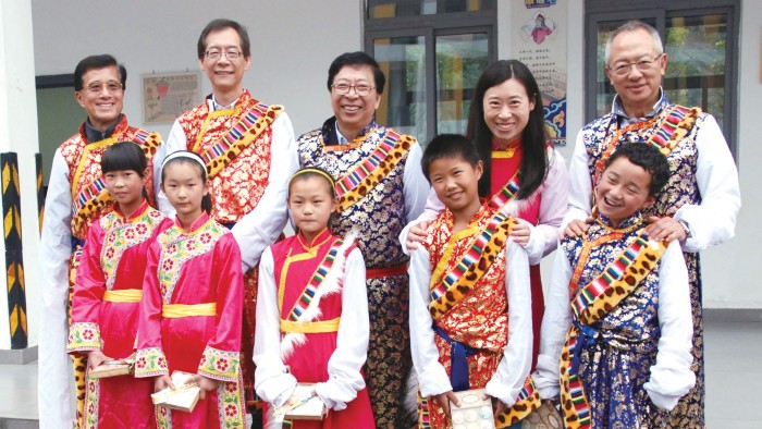 Dr Chung (back row, right) regards his visit to Sichuan in 2013 as his most memorable experience at PolyU. He witnessed PolyU’s efforts in helping to rebuild Sichuan and children’s lives following the 8-magnitude earthquake there in 2008.