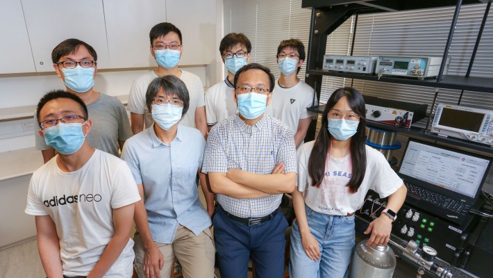 Professor Jin Wei (front row, second from right) and his research team