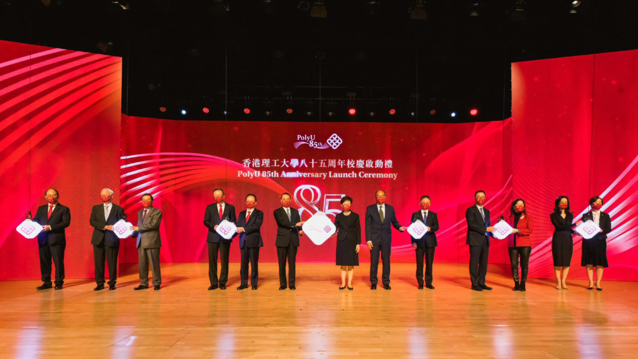 From left: Professor Wing-tak Wong, PolyU Deputy President and Provost; Dr Lawrence Li Kwok-chang, Deputy Chairman of PolyU Council; Mr Carlson Tong, Chairman of UGC; Professor Jin-Guang Teng, PolyU President; Professor Tan Tieniu, Deputy Director of the Liaison Office of the Central People’s Government in the HKSAR; Mr Liu Guangyuan, Commissioner of the Ministry of Foreign Affairs in the HKSAR; Mrs Carrie Lam Cheng Yuet-ngor, Chief Executive of the HKSAR; Dr Lam Tai-fai, PolyU Council Chairman; Professor Jiang Jianxiang, Director-General of the Department of Educational, Scientific and Technological Affairs of the Liaison Office; Mr Kevin Yeung, Secretary for Education; Dr Katherine Ngan,  Chairman of the University Court; Ms Loretta Fong, Treasurer of the University; and Dr Miranda Lou, PolyU Executive Vice President.