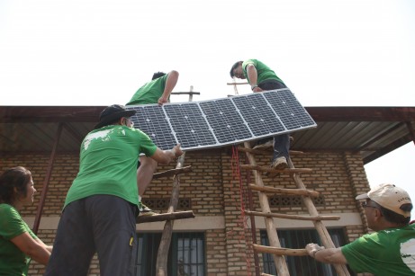 PolyU students have a long history of helping Africanvillages install solar power systems. This photo is froma Service-Learning project in Rwanda in 2014.