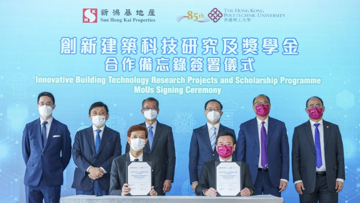 (Front row, from left) Mr Eric Tung, SHKP Executive Director, and Prof. Christopher Chao, PolyU Vice President (Research and Innovation), signed an MoU, witnessed by (back row, from left) Mr Adam Kwok, SHKP Executive Director; Mr Raymond Kwok, SHKP Chairman and Managing Director; Mr Paul Chan, Financial Secretary of the HKSAR; Mr Zhang Zhihua, Director General of the Youth Department of the Liaison Office of the Central People's Government in the HKSAR; Dr Lam Tai-fai, PolyU Council Chairman; and Prof. Wing-tak Wong, PolyU Acting President.