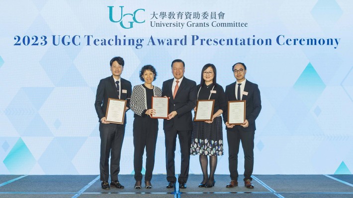 The IaH team, led by Prof. Engle Angela Chan, Interim Head and Professor, School of Nursing of PolyU (2nd from left), receives the 2023 UGC Teaching Award in the Collaborative Teams category from Mr Tim Lui, Chairman of UGC (centre). Attending team members included Dr Arkers Kwan-ching Wong, Assistant Professor (1st from left); Mr Timothy Kam-hung Lai, Associate Professor of Practice (1st from right); and Dr Betty Pui-man Chung, Assistant Professor of Practice (2nd from right), School of Nursing of PolyU.