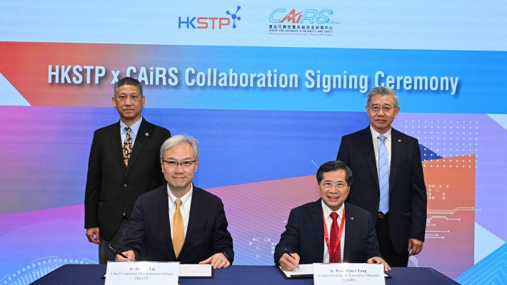 Dr HL Yiu, Chief Corporate Development Officer of HKSTP (front, left) and Prof Winco Yung, Centre Director and Executive Director of CAiRS (front, right), signed the collaboration agreement witnessed by Mr Oscar Wong, Head of Business Development of HKSTP (back, left) and Prof. Man Hau-chung, Dean of Faculty of Engineering of PolyU (back, right).