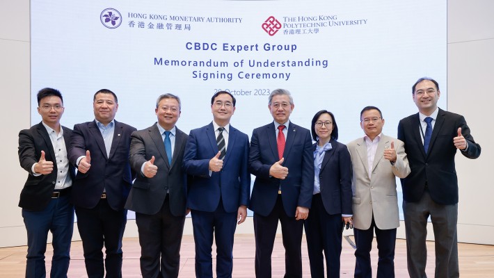 (From right to left) Prof. Allen Man Ho Au, Professor of Department of Computing; Prof. Qing Li, Head of Department of Computing; Prof. Christina Wong, Director of Research and Innovation Office; Prof. H.C. Man, Dean of the Faculty of Engineering; Mr Colin Pou, Executive Director (Financial Infrastructure) of HKMA; and Prof. Daniel Xiapu Luo, Professor of the Department of Computing.