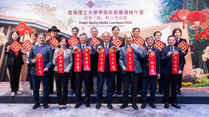 PolyU Council Chairman Dr Lam Tai-fai (front row, centre) and President Prof. Jin-Guang Teng (front row, third from left), alongside other senior management team members, faculty/school deans and other PolyU representatives, outlined the University’s latest developments at a media luncheon held in March.