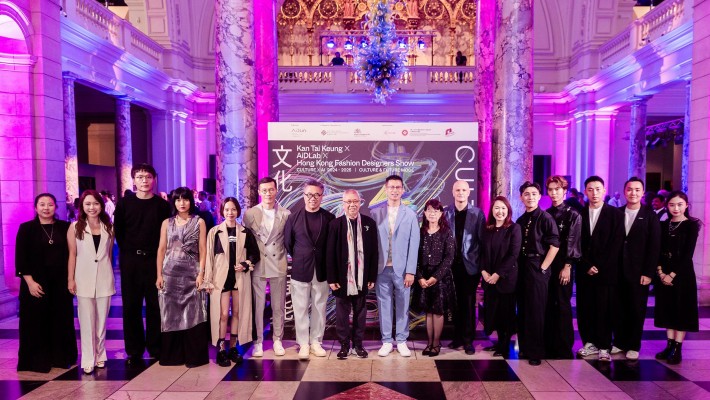 Organised by AiDLab, a joint establishment by PolyU and the Royal College of Art, the Culture X AI 2024-2025: Kan Tai Keung X AiDLab X Hong Kong Fashion Designers Show was held at the Victoria and Albert Museum, the United Kingdom. Photo shows (from sixth left) Prof. Calvin Wong, Centre Director of AiDLab; Mr Eric Yim, Chairman of Hong Kong Design Centre; Dr Kan Tai-keung, renowned artist and ink painter; Mr Gilford Law, Director-General of the London ETO; Mrs Lowell Cho, Assistant Commissioner for Cultural and Creative Industries; Prof. Christoph Lindner, President and Vice-Chancellor of the Royal College of Art; Prof. Jeanne Tan, Professor of School of Fashion and Textiles of PolyU; and Hong Kong fashion designers at the show.