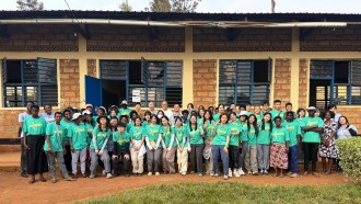 Dr Lam Tai-fai, PolyU Council Chairman (seated, right); Prof. Jin-Guang Teng, President (standing, left), and Prof. Ben Young, Vice President (Student and Global Affairs) (standing, 2nd from left), joined the Service-Learning journey in Rwanda. 