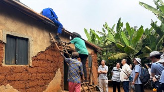 Dr Lam Tai-fai, PolyU Council Chairman; Prof. Jin-Guang Teng, President, and Prof. Ben Young, Vice President (Student and Global Affairs) witnessed the rural electrification in rural Rwanda, seeing how it changes the lives of the locals.
