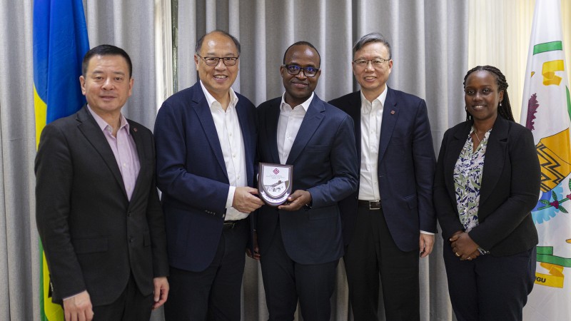 Dr Lam Tai-fai, Council Chairman (2nd from left); Prof. Jin-Guang Teng, President (2nd from right), and Prof. Ben Young, Vice President (Student and Global Affairs) (left), met with Mr Gaspard Twagirayezu, Minister of Education (centre), during their visit to Rwanda.