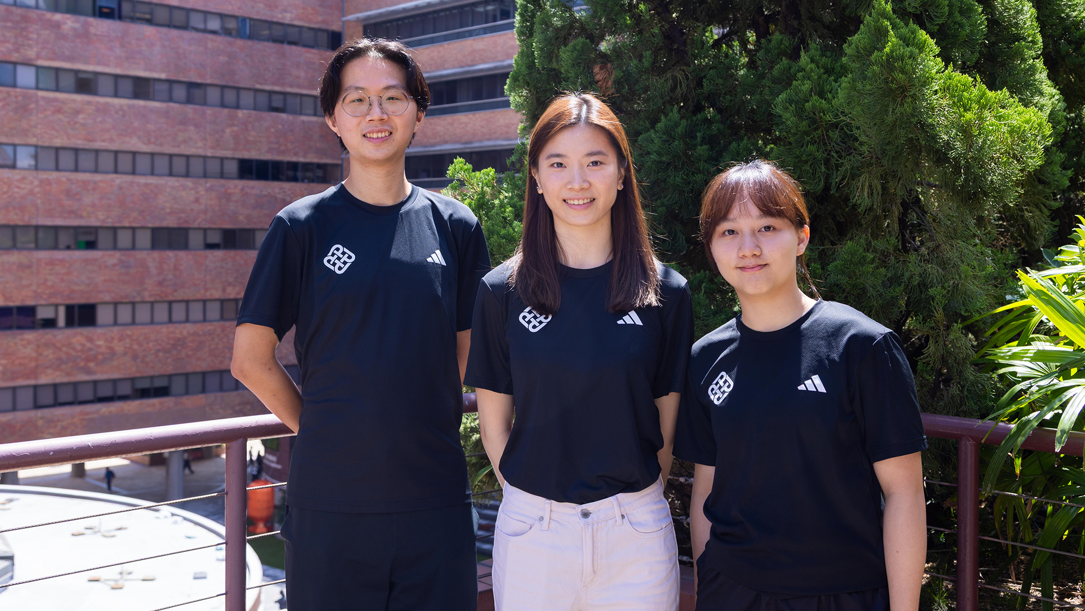 PolyU physiotherapy students Chin Ka Ming (left), Wong Wai Shan, and Poon Wing Sum (right).