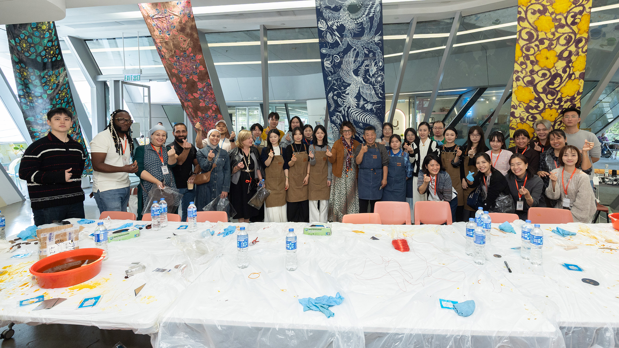 Professor Guan Lansheng from Beijing Union University led a natural dye workshop where participants created fashion accessories inspired by Silk Road elements, emphasising the fusion of theory and practice.