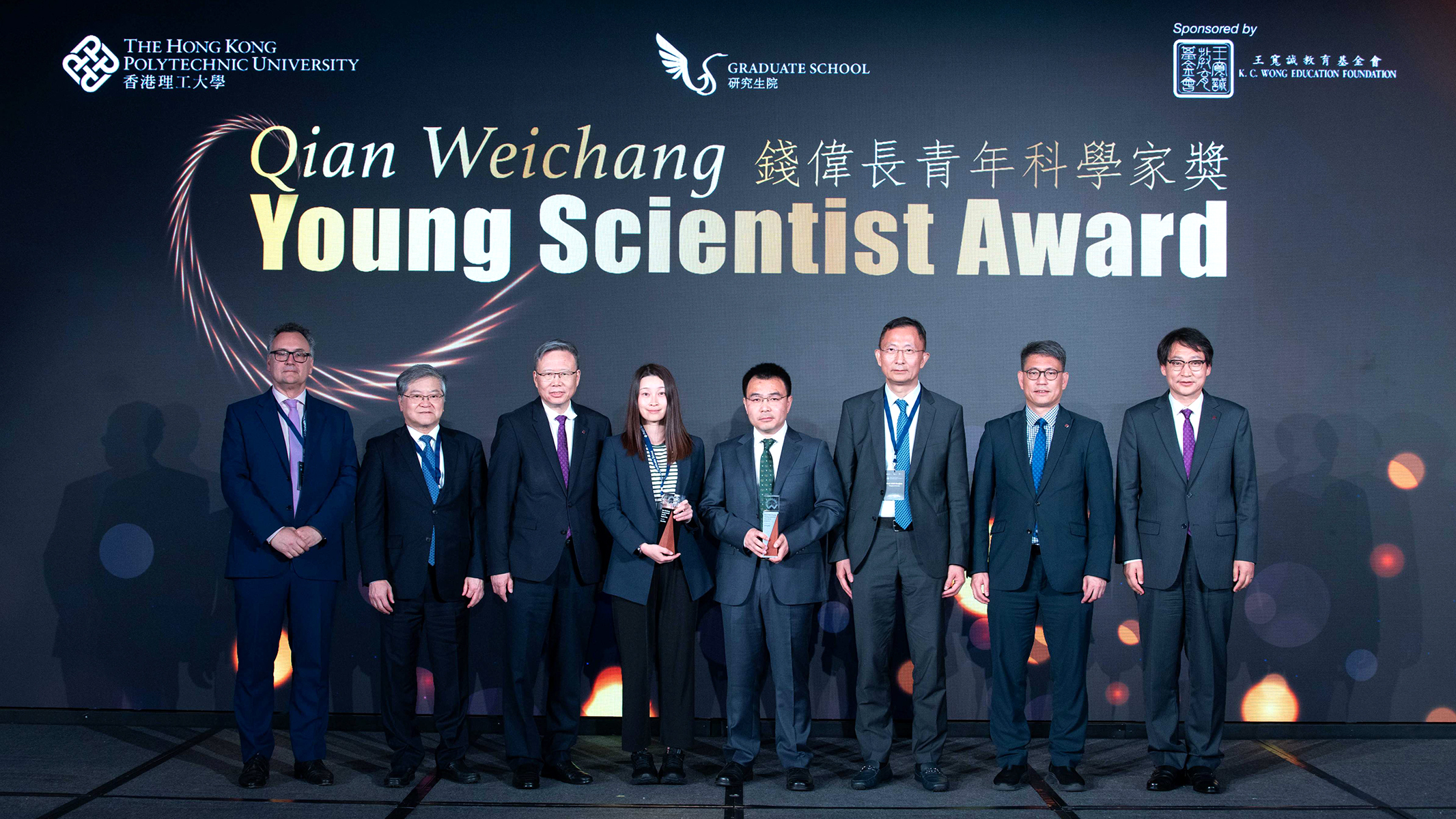 Recipients of the Qian Weichang Young Scientist Awards: Prof. Zhao Ruike of Stanford University (4th from left) and Prof. Song Bai of Peking University (4th from right), joined by distinguished guests and scholars - Prof. George Malliaras (1st from left), Prof. Norman Chihnan Tien (2nd from left), Prof. Jin-Guang Teng (3rd from left), Prof. Gao Huajian (3rd from right), Prof. Christopher Chao (2nd from right), and Prof. Wang Zuankai (first from right).