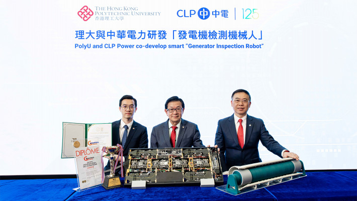 Prof. Tam Hwa-yaw (centre); Mr Kevin Lau (1st from right); and Mr Victor Leung, Research Assistant at PolyU (1st from left), introduce the “Generator Inspection Robot” co-developed by PolyU and CLP Power, pioneering automated inspection solutions through innovative technology.