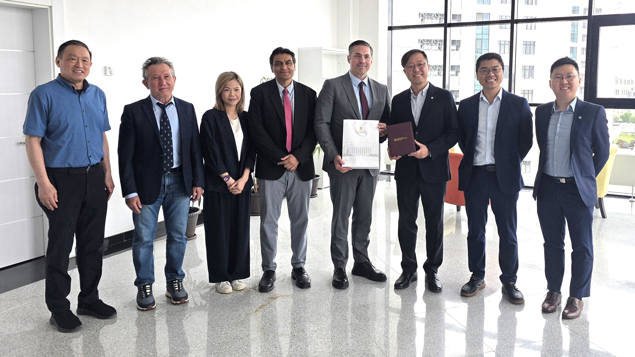 During the visit to Kazakhstan, the PolyU delegation was received by Prof. Rehan Sadiq (4th from left) and his team.