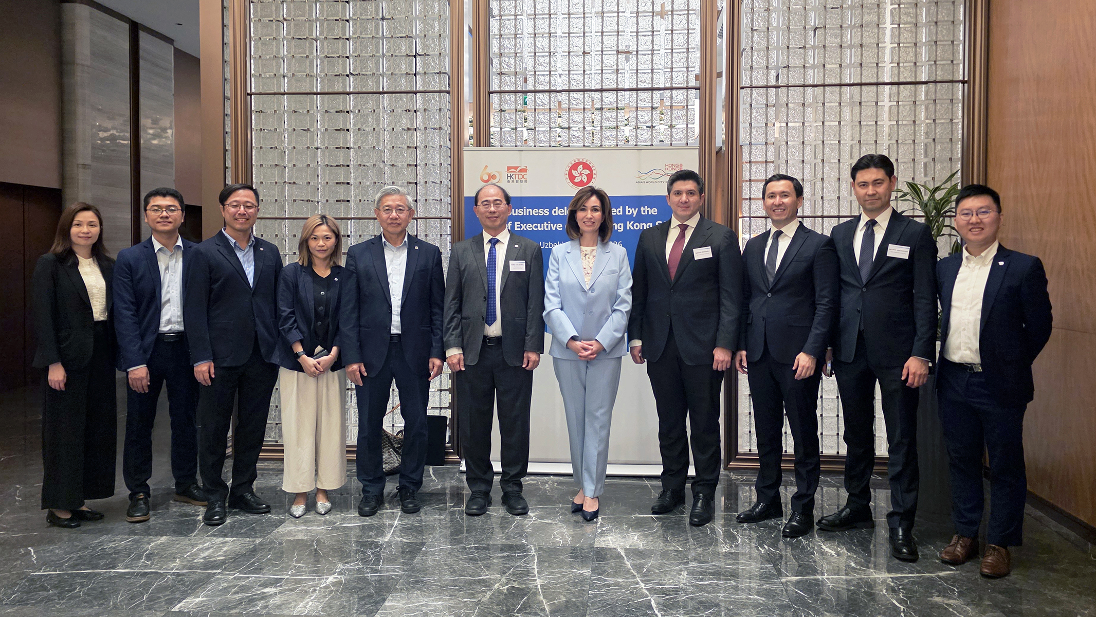 Led by Prof. Wing-tak Wong (centre) and Prof. H.C. Man (5th from left), the PolyU delegation engaged with Dr Bahodir Ahmedov Bobomurodovich (4th from right) and Dr Gulnoza Ismailova (5th from right) during the HKSAR Government Business Networking event in Uzbekistan.