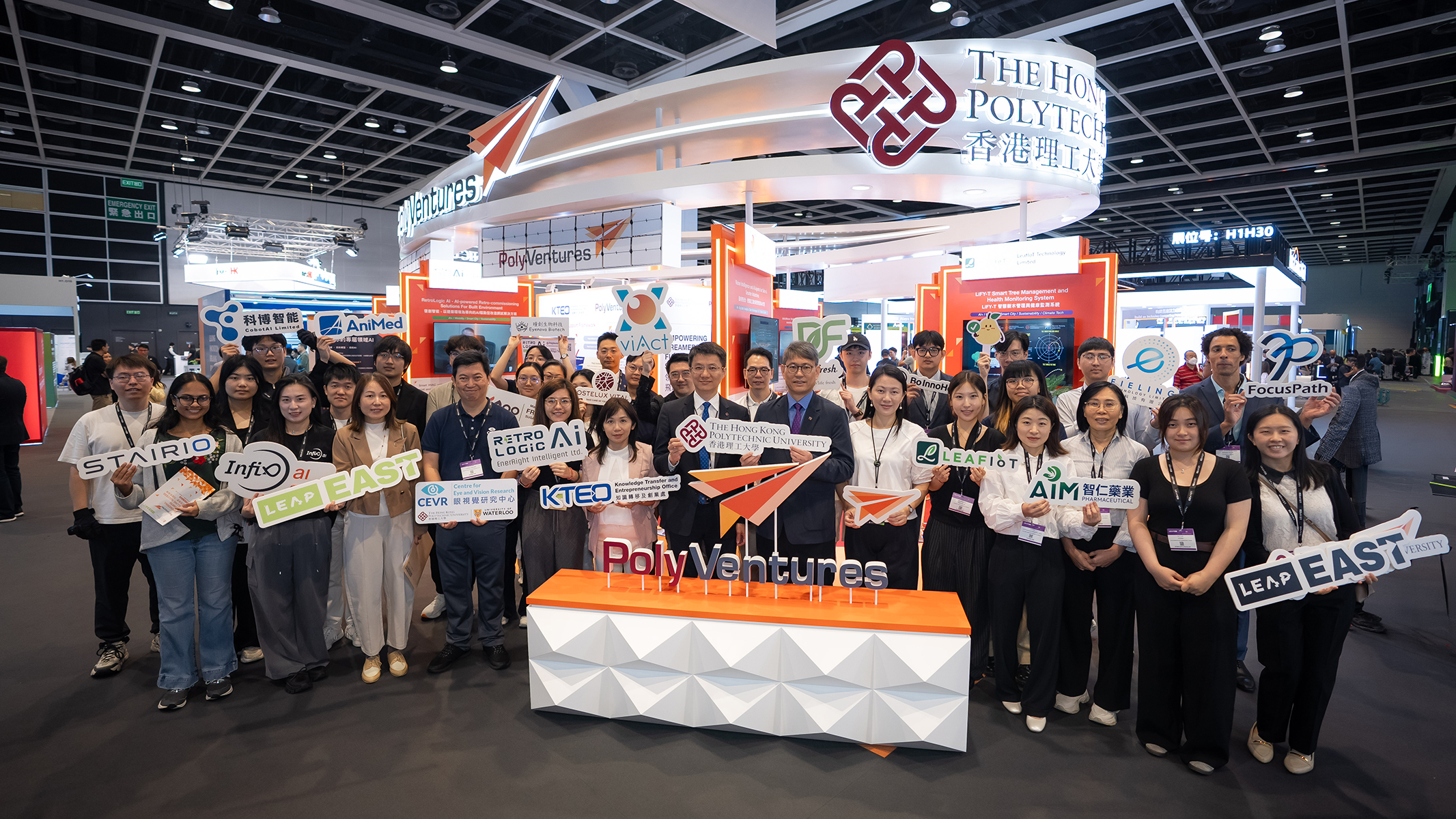 Prof. Christopher Chao, Senior Vice President (Research and Innovation) of PolyU (right, centre) and Prof. Zheng Zijian, Vice President (Knowledge Transfer) of PolyU (left, centre), joined startups of PolyU showcasing the latest technologies at LEAP East 2026.