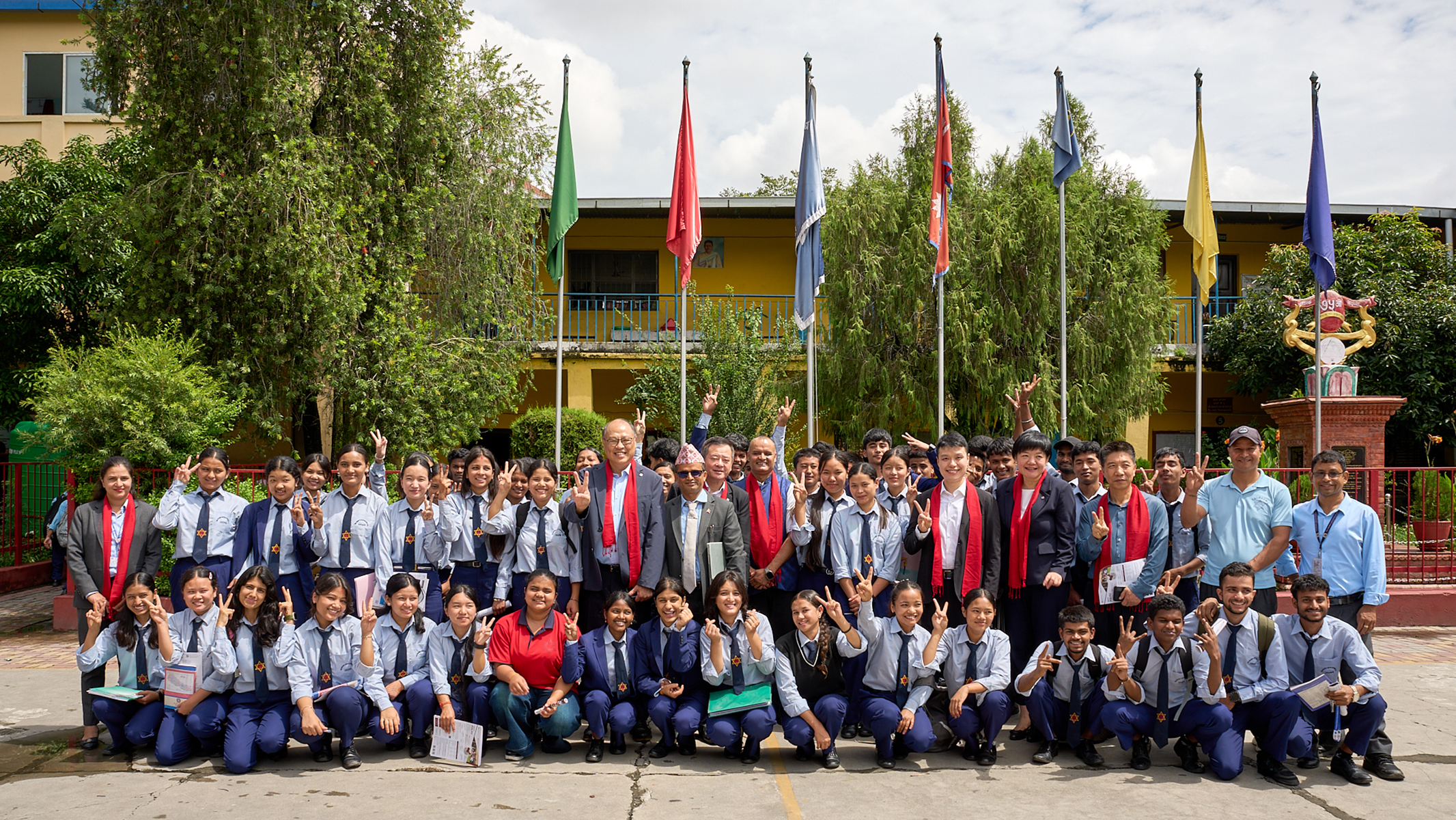 Members of the PolyU delegation posed for a group photo with students at Tri-Padma Vidyashram Secondary School in Nepal.