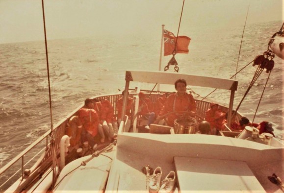 Daring the rough sea during the Outward Bound land and sea course, exhausted by seasickness