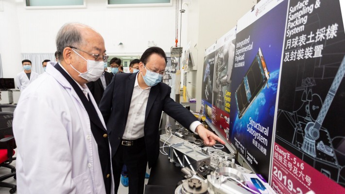 Prof Yung Kai-leung shows the “Surface Sampling and Packing System” designed for the Chang’e 5 lunar exploration project.