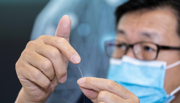 PolyU’s novel plastic fiber optic microsensors are extremely sensitive to very small pressure changes inside the human body, ideal for medical monitoring, such as via integration into this fine smart cochlear implant.