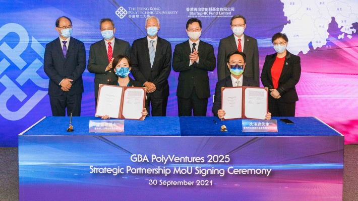 Dr Miranda Lou, Executive Vice President of PolyU (front left), and Mr Hendrick Sin, Chairman of StartupHK Fund Ltd (front right), signed the “GBA PolyVentures 2025” Strategic Partnership MoU, witnessed by (starting from left at the back) Professor Wing-tak Wong, Deputy President and Provost of PolyU, Mr Richard Leung, PolyU Council Member, Dr Lawrence Li Kwok-chang, PolyU’s Deputy Council Chairman, Mr Alfred Sit, Secretary for Innovation and Technology of the HKSAR Government, Professor Jin-Guang Teng, PolyU President, and Dr Winnie Tang, Honorary Chairman of StartupHK Fund Ltd.