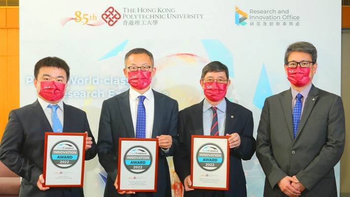 Prof. Christopher Chao, Vice President (Research and Innovation) (1st from right) congratulates the award-winning PolyU research teams. From left: Dr Dahua Shou, Prof. Jing Cai and Prof. Hong Hu.