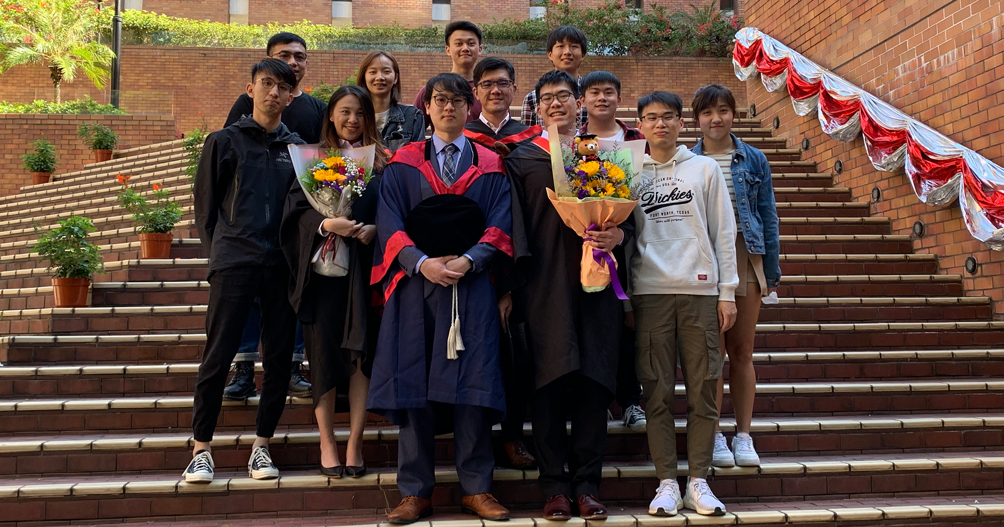 Dr NG Kam Hung with his research team members and Aviation Engineering students (Taken on AAE Graduation Day - 29 Nov 2021)