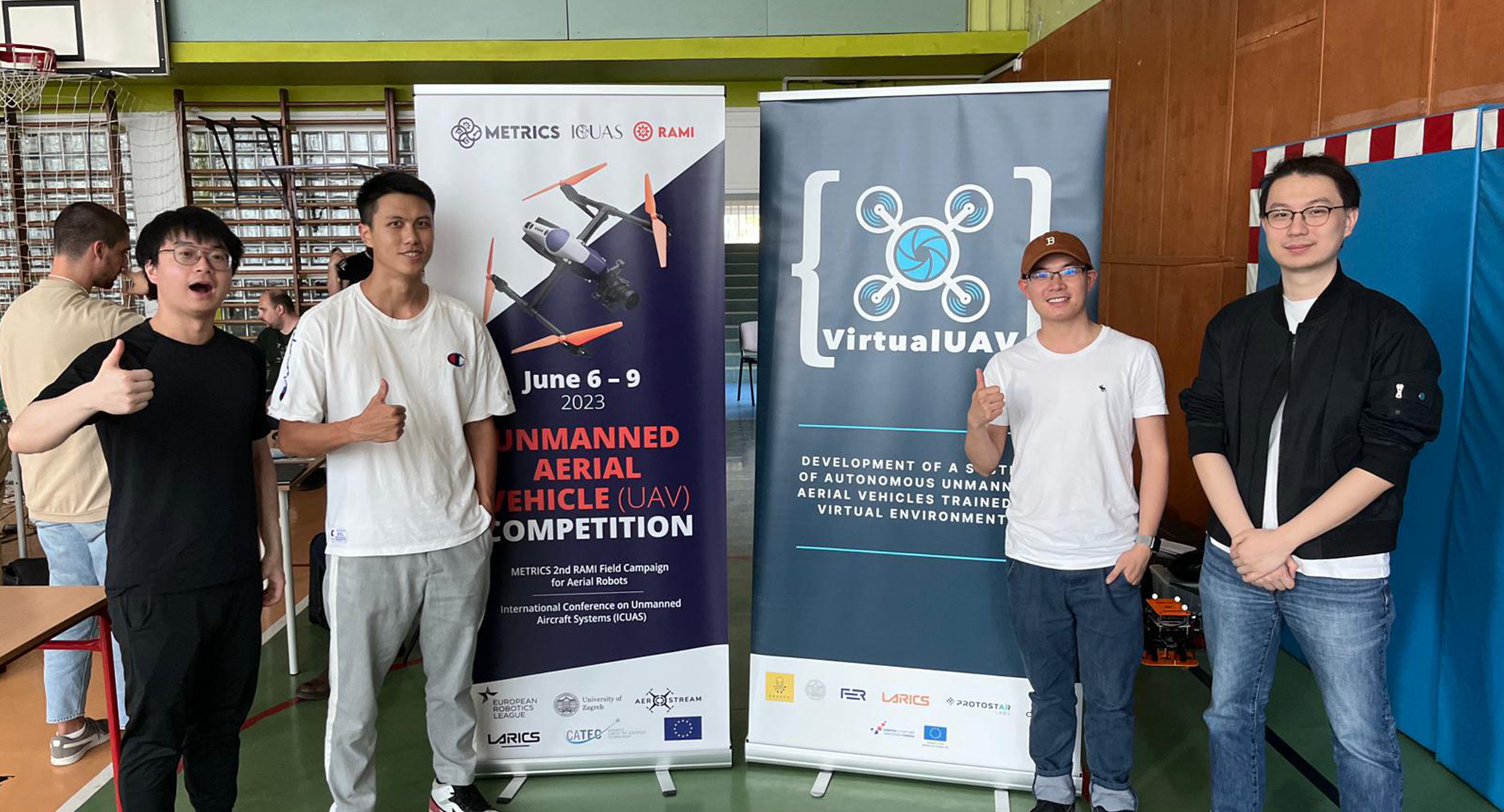 The AAE research team comprising Ph.D. students Li-yu LO (1st left), Bailun JIANG (1st right), Wenyu YANG (2nd left), and Kwai-wa TSE (2nd right) participated at the ICUAS'23 held on June 6-9, 2023, in Warsaw, Poland.