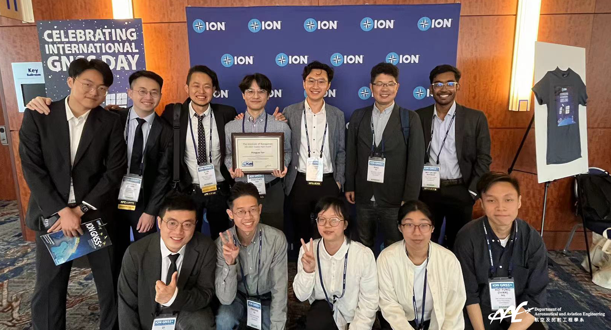 The Department members congratulated Mr.  Penggao Yan (holding the award certificate) at the award presentation ceremony.