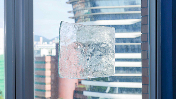 Smart window film regulates light and humidity - button