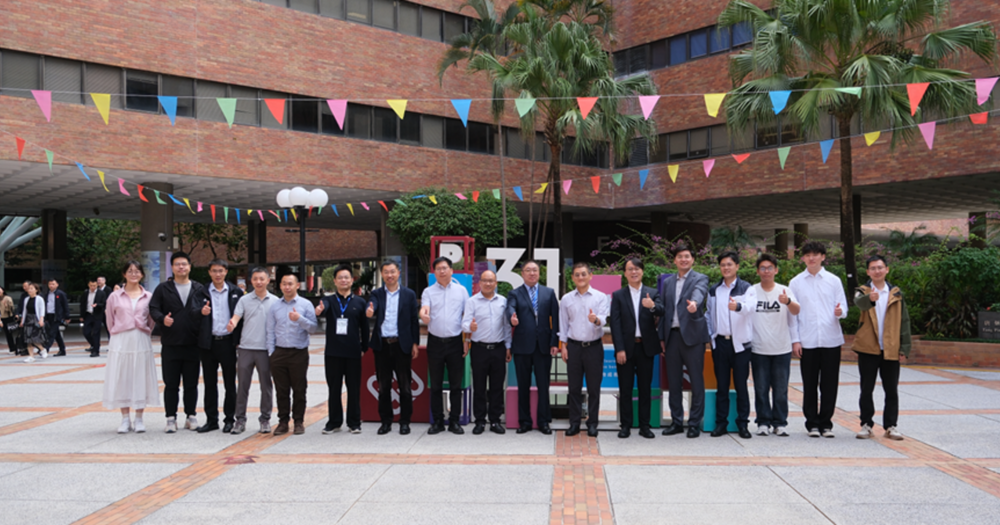 Group photo of the Fourth Jiangsu-Hong Kong-Macau University Alliance (JHMUA) Remote Sensing and Environment Academic Forum at PolyU.
