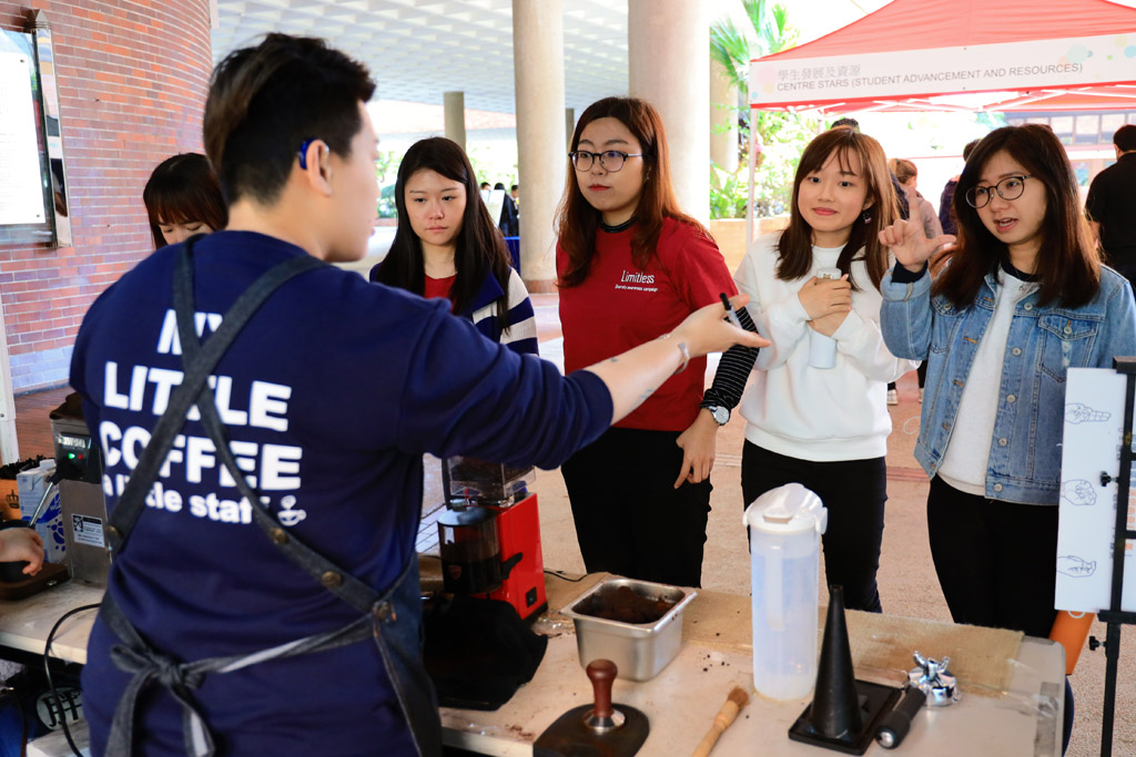 Students using sign language to order coffee