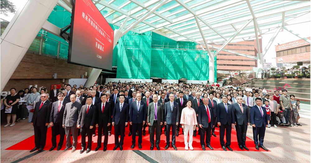 The flag-raising ceremony was officiated by PolyU Council Chairman Dr Lam Tai-fai (7th from left); Acting President Prof. Wing-tak Wong (7th from right); Mr Song Yiping, Second-Level Inspector of the Office for Safeguarding National Security of the Central People’s Government of the People’s Republic of China in the HKSAR (6th from left); and Mr Tian Zhenfeng, Deputy Director of the Consular Department of the Office of the Commissioner of the Ministry of Foreign Affairs in the HKSAR (6th from right). They were joined by Deputy Council Chairman Dr Daniel Yip Chung-yin (5th from left), University Court Chairman Dr Katherine Ngan Ng Yu-ying (5th from right); Treasurer of the University Mr Arthur Lee Kin (4th from left); Honorary Court Chairman Dr Roy Chung Chi-ping (4th from right); President Emeritus Prof. the Honourable Poon Chung-kwong (3rd from left); and Senior Vice President (Research and Innovation) Prof. Christopher Chao (3rd from right), together with Council and Court members, other University senior management, Honorary Graduates, University Fellows, Outstanding Alumni, members of the PolyU Foundation, and close to 400 distinguished guests, staff, students and alumni.