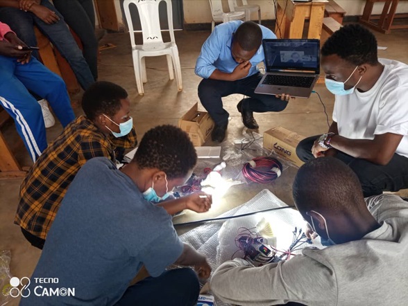 Teaching Rwandan groupmates about the system via Zoom