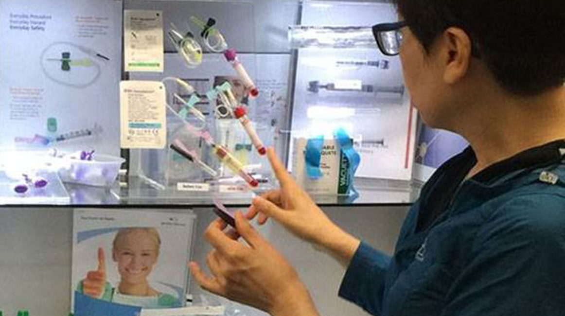 ms-kit-ying-so-laboratory-manager-demonstrates-the-latest-designs-in-needle-safety