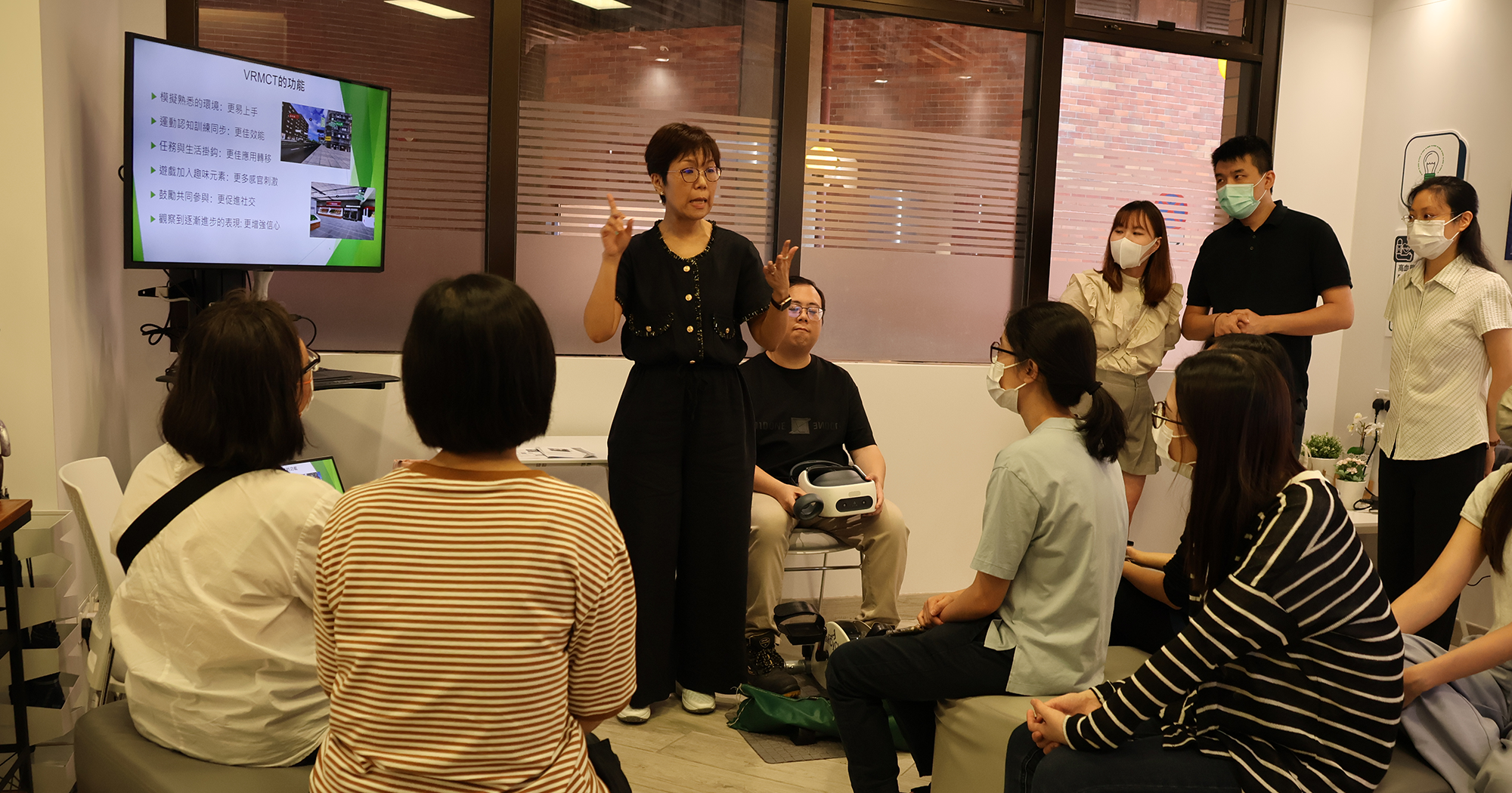 Prof. Justina Liu provided training on how to use the system to the staff members at Yuen Long DHC.