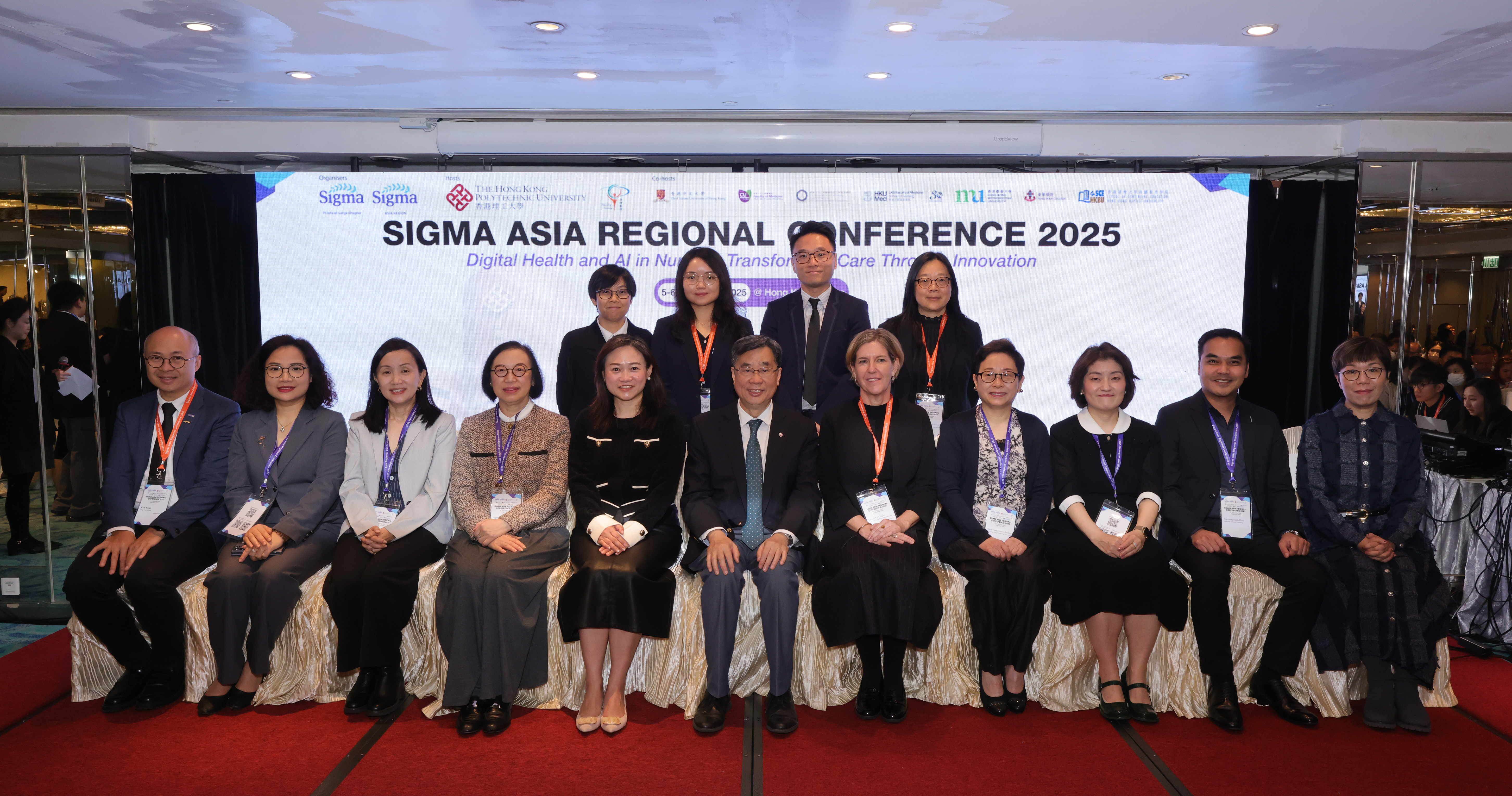 PolyU School of Nursing co-hosts the Sigma Asia Regional Conference 2025. Distinguished guests at the opening ceremony included Prof. David Shum, Dean of the PolyU Faculty of Health and Social Sciences, Yeung Tsang Wing Yee and Tsang Wing Hing Professor in Neuropsychology, and Chair Professor of Neuropsychology (front row, 6th from left); Prof. Janelle Yorke, Co-Chair of the Conference, Vice President of Pi lota At-Large Chapter, Hong Kong Special Administrative Region Global STEM Professor, Head of the PolyU School of Nursing, Angel S.P. Chan Lau Professor in Health and Longevity, and Chair Professor of Nursing (front row, 5th from right); Prof. Janet Wong, Dean of the School of Nursing and Health Sciences at Hong Kong Metropolitan University (front row, 5th from the left); Prof. Sok Ying Liaw, Professor and Head of the Alice Lee Centre for Nursing Studies, Yong Loo Lin School of Medicine at the National University of Singapore (front row, 3rd from the left); Prof. Michael Joseph Dino, Director of Research Development and Innovation at Our Lady of Fatima University, Philippines (front row, 2nd from the right); Prof. Younhee Kang, Dean of the College of Nursing at Ewha Womans University, South Korea (front row, 3rd from right); Dr Huyen Thi Hoa Nguyen, Director of the Nursing Program at VinUniversity, Vietnam (front row, 2nd from the left) and the Conference Organizing Committee Chairs.