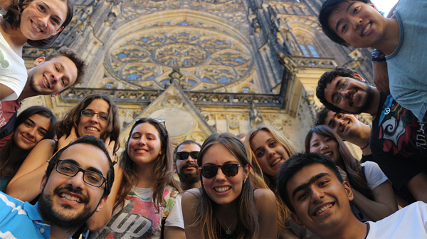 Happy multiracial teenagers taking selfie outdoor